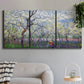 Three-panel canvas wall art featuring fresh spring countryside landscape, displayed in a modern living room above a sofa.