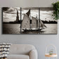 Three-panel canvas wall art featuring historic sailing ships photograph, displayed in a modern living room above a sofa.