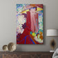 Canvas art print featuring a modern portrait with decorative patterns and vivid color displayed in a modern interior space.