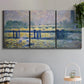 Three-panel canvas wall art featuring london bridge crossing wide river, displayed in a modern living room above a sofa.