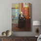 Canvas art print featuring a cozy room with rich red walls and a seated figure absorbed in a book displayed in a modern interior space.