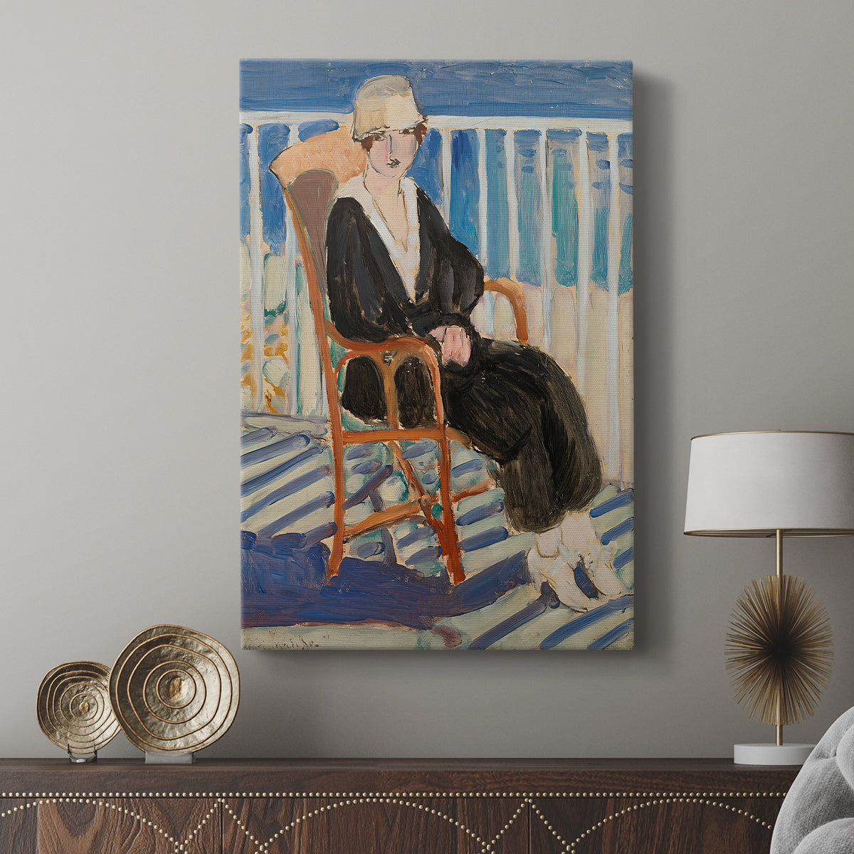 Canvas art print featuring a bright composition with a figure and coastal background displayed in a modern interior space.