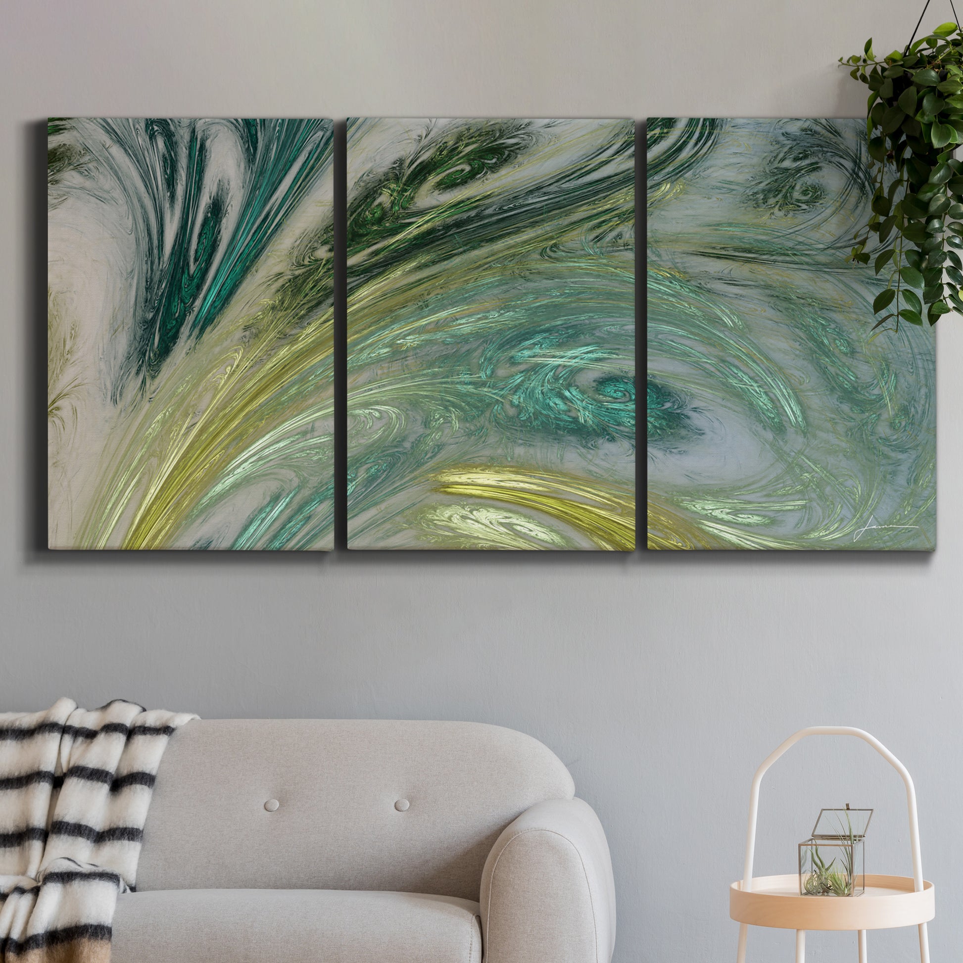 Three-panel canvas wall art featuring layered modern abstract landscape, displayed in a modern living room above a sofa.
