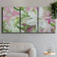 Three-panel canvas wall art featuring pink and white lilies botanical study, displayed in a modern living room above a sofa.