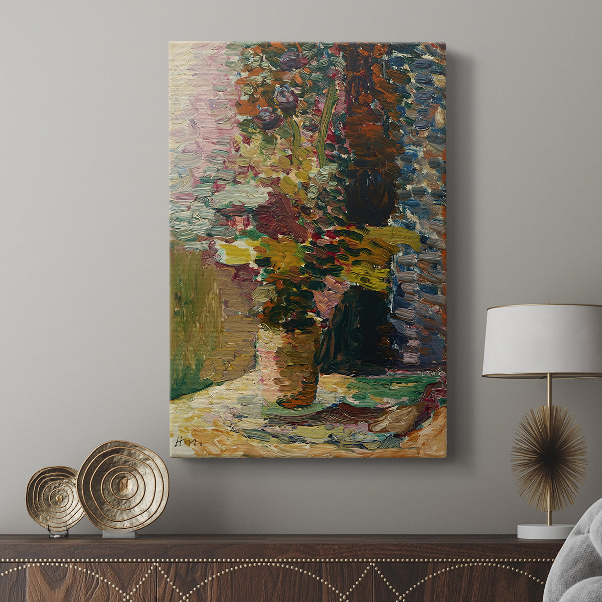 Canvas art print featuring a decorative composition with blossoms and vivid palette displayed in a modern interior space.