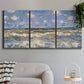 Three-panel canvas wall art featuring rough sea with crashing waves, displayed in a modern living room above a sofa.