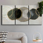 Three-panel canvas wall art featuring smooth abstract river stone forms, displayed in a modern living room above a sofa.