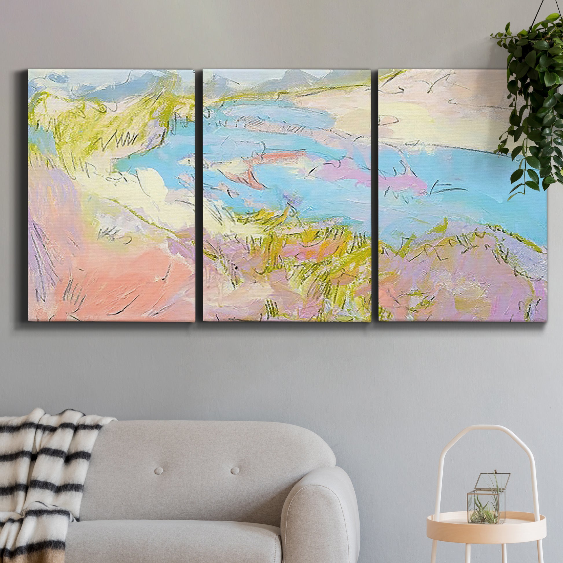 Three-panel canvas wall art featuring geometric mid century abstract blocks, displayed in a modern living room above a sofa.