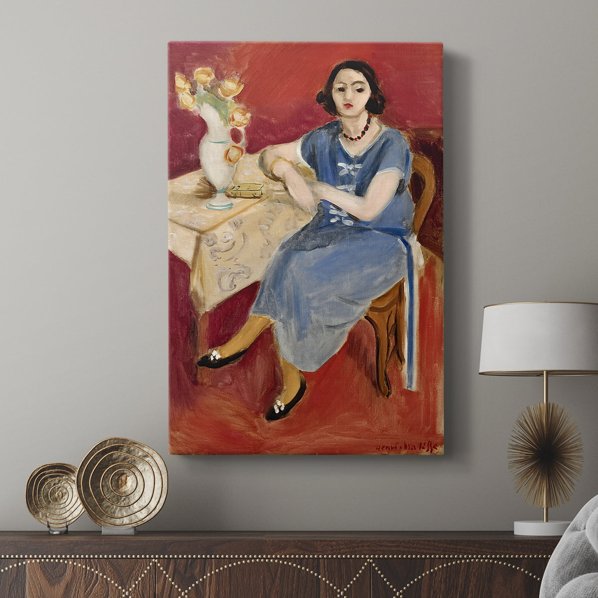 Canvas art print featuring a stylized figure with flat tones and geometric balance displayed in a modern interior space.