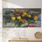 Three-panel canvas wall art featuring still life with pears and grapes, displayed in a minimalist living room above a console table.