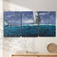 Three-panel canvas wall art featuring sailboats moving across water, displayed in a minimalist living room above a console table.