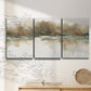 Three-panel canvas wall art featuring soft abstract mirrored reflections, displayed in a minimalist living room above a console table.