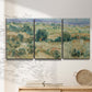 Three-panel canvas wall art featuring lavender sky over quiet landscape, displayed in a minimalist living room above a console table.