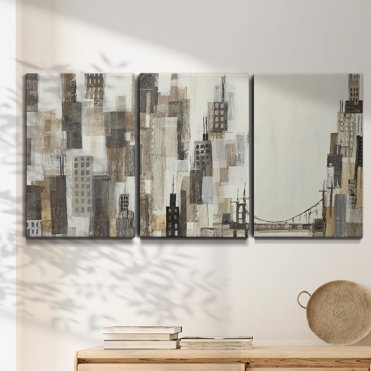 Three-panel canvas wall art featuring abstract harbor inspired composition, displayed in a minimalist living room above a console table.