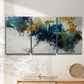 Three-panel canvas wall art featuring teal abstract paint splatter, displayed in a minimalist living room above a console table.
