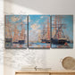 Three-panel canvas wall art featuring harbor with boats and water, displayed in a minimalist living room above a console table.