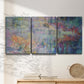 Three-panel canvas wall art featuring abstract evening landscape with depth, displayed in a minimalist living room above a console table.
