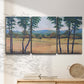Three-panel canvas wall art featuring quiet morning landscape with trees, displayed in a minimalist living room above a console table.
