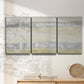Three-panel canvas wall art featuring minimal abstract storm movement, displayed in a minimalist living room above a console table.