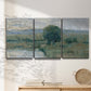 Three-panel canvas wall art featuring riverbank landscape with reflections, displayed in a minimalist living room above a console table.