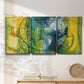 Three-panel canvas wall art featuring energetic abstract aquatic color motion, displayed in a minimalist living room above a console table.