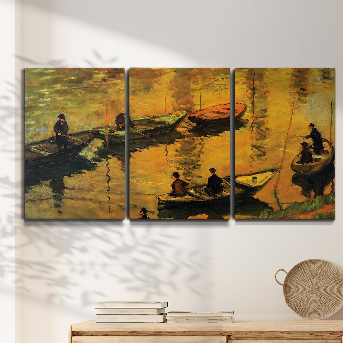 Three-panel canvas wall art featuring small boat on calm water, displayed in a minimalist living room above a console table.
