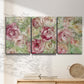 Three-panel canvas wall art featuring blooming climbing rose, displayed in a minimalist living room above a console table.