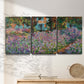 Three-panel canvas wall art featuring blooming irises in garden bed, displayed in a minimalist living room above a console table.