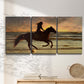 Three-panel canvas wall art featuring running horse along beach photograph, displayed in a minimalist living room above a console table.
