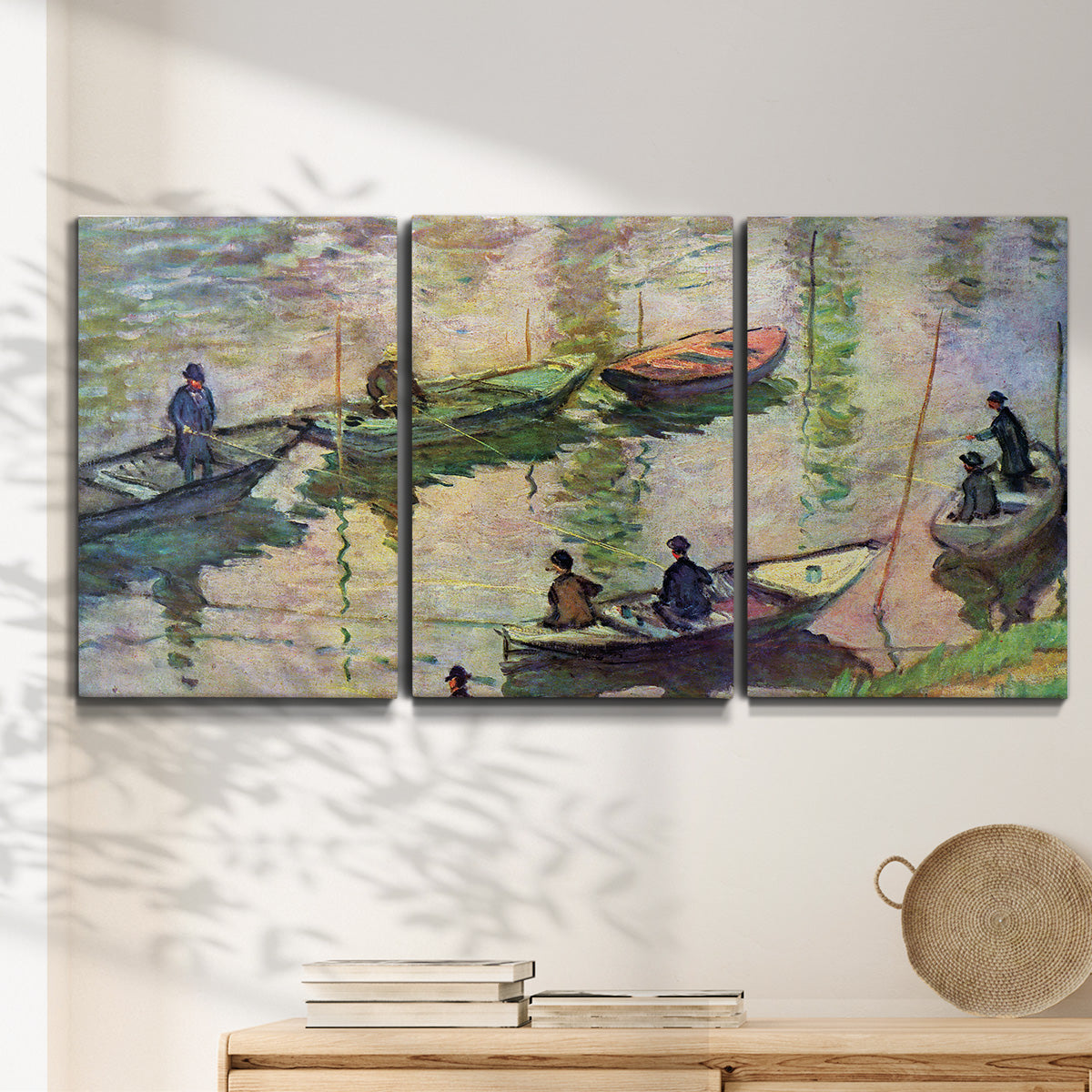 Three-panel canvas wall art featuring river scene with boats and reflections, displayed in a minimalist living room above a console table.