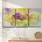 Three-panel canvas wall art featuring abstract floral rhythm composition, displayed in a minimalist living room above a console table.