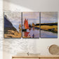Three-panel canvas wall art featuring stone breakwater at low tide, displayed in a minimalist living room above a console table.