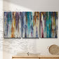 Three-panel canvas wall art featuring abstract shifting color forms, displayed in a minimalist living room above a console table.