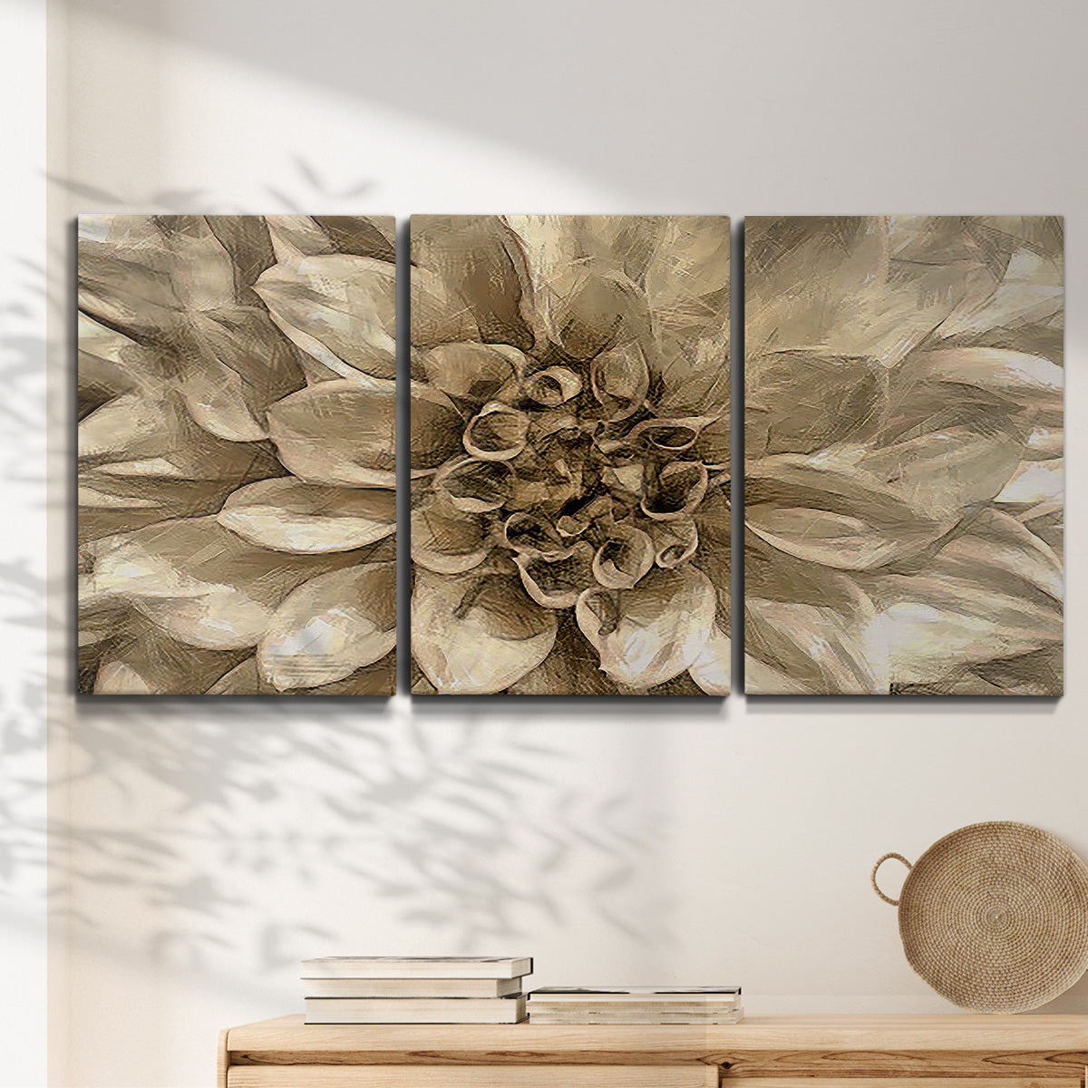 Three-panel canvas wall art featuring monochrome floral linework composition, displayed in a minimalist living room above a console table.