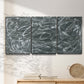 Three-panel canvas wall art featuring abstract view through window forms, displayed in a minimalist living room above a console table.