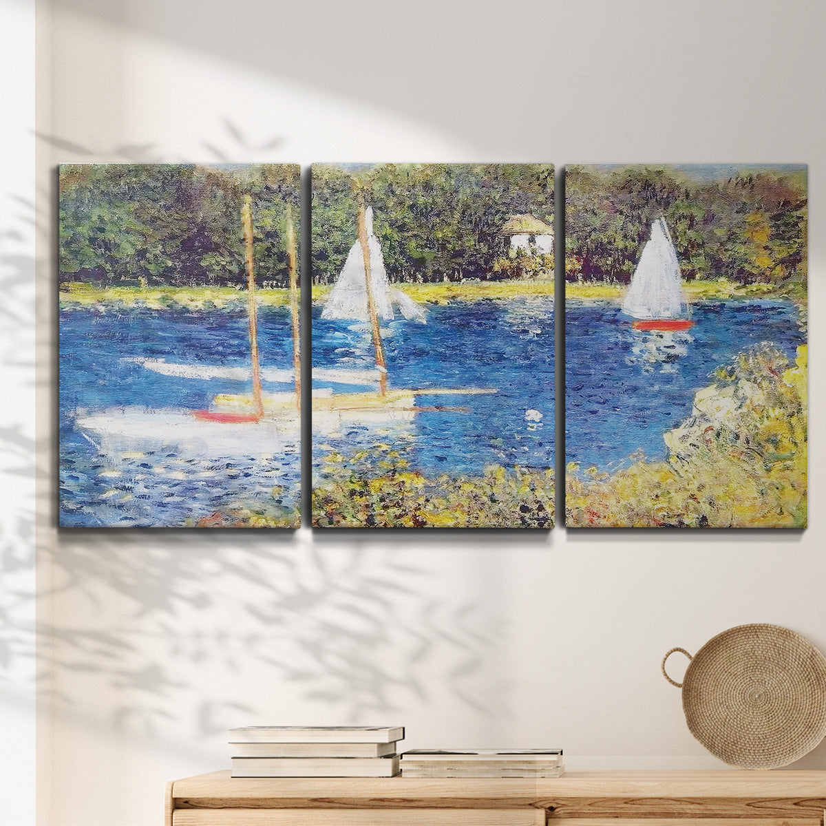 Three-panel canvas wall art featuring river scene with reflections, displayed in a minimalist living room above a console table.