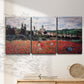 Three-panel canvas wall art featuring poppy field beside village landscape, displayed in a minimalist living room above a console table.