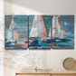Three-panel canvas wall art featuring graphic pop style sailboats, displayed in a minimalist living room above a console table.