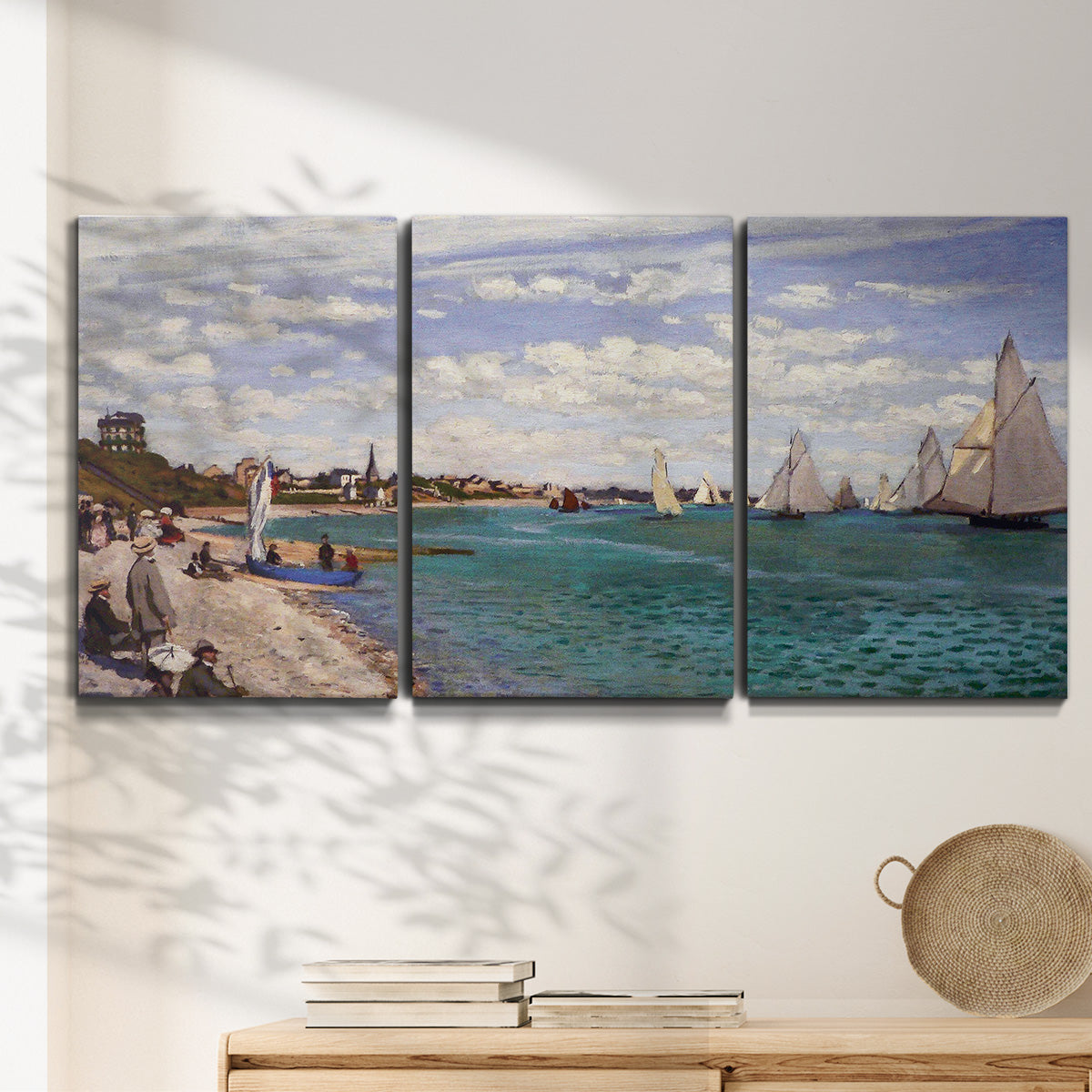 Three-panel canvas wall art featuring river basin with boats, displayed in a minimalist living room above a console table.