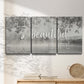 Three-panel canvas wall art featuring uplifting life themed typography, displayed in a minimalist living room above a console table.