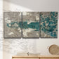Three-panel canvas wall art featuring layered mineral abstract textures, displayed in a minimalist living room above a console table.