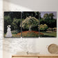 Three-panel canvas wall art featuring woman seated in garden landscape, displayed in a minimalist living room above a console table.