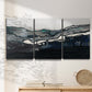 Three-panel canvas wall art featuring abstract passage of time composition, displayed in a minimalist living room above a console table.