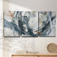 Three-panel canvas wall art featuring repeating abstract geometric array, displayed in a minimalist living room above a console table.