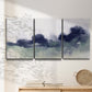 Three-panel canvas wall art featuring misty abstract lake watercolor, displayed in a minimalist living room above a console table.