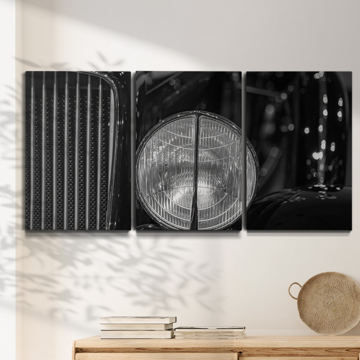 Three-panel canvas wall art featuring vintage car grille detail, displayed in a minimalist living room above a console table.