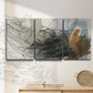 Three-panel canvas wall art featuring dynamic circular abstract motion, displayed in a minimalist living room above a console table.