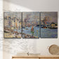 Three-panel canvas wall art featuring evening harbor with reflections, displayed in a minimalist living room above a console table.