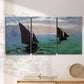Three-panel canvas wall art featuring fishing boats moving through open sea, displayed in a minimalist living room above a console table.
