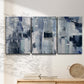 Three-panel canvas wall art featuring soft abstract mountain color fields, displayed in a minimalist living room above a console table.